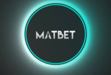 A person using a smartphone to place bets on a secure online platform